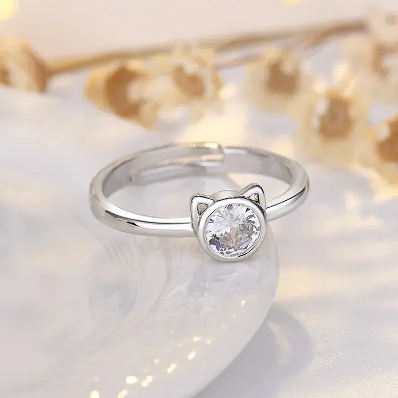 Ring with cat and zircons