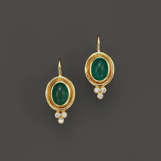 Gold vintage earrings with green stone