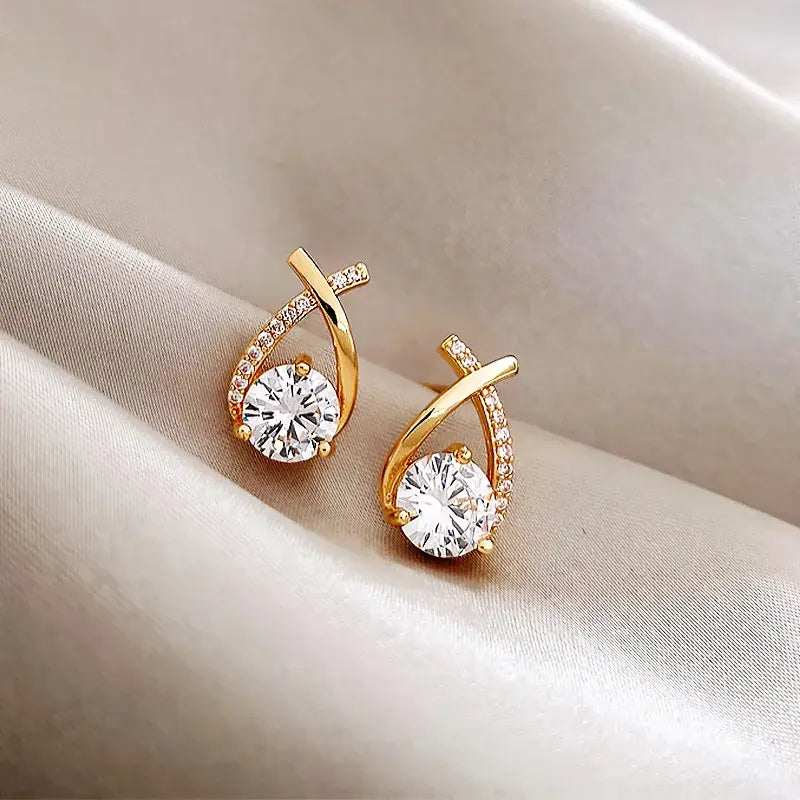 Elegant earrings with white cross zircons
