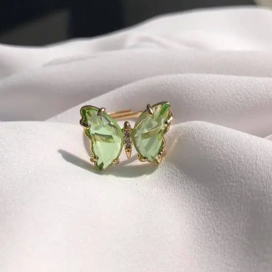 Ring with green crystal butterfly