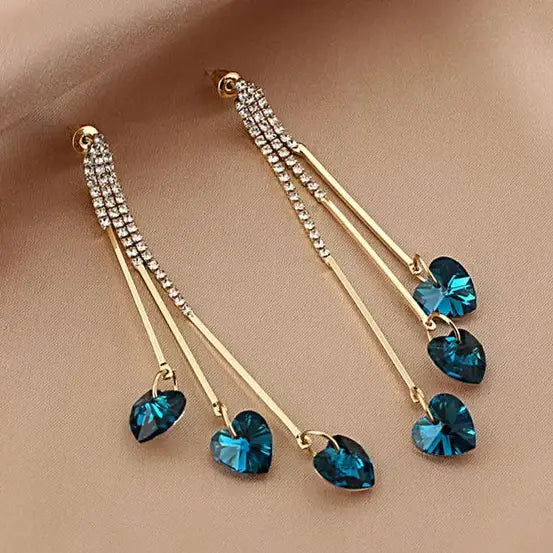 Elegant rainbow earrings with blue crystal heart