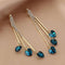Elegant rainbow earrings with blue crystal heart