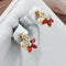 Elegant earrings with red crystals