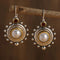 Vintage style pearl earrings with silver and gold inserts