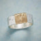 Silver ring with gold thread