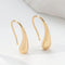 Gold earrings in vintage style