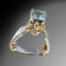 Gold and silver ring with blue zircons in vintage style