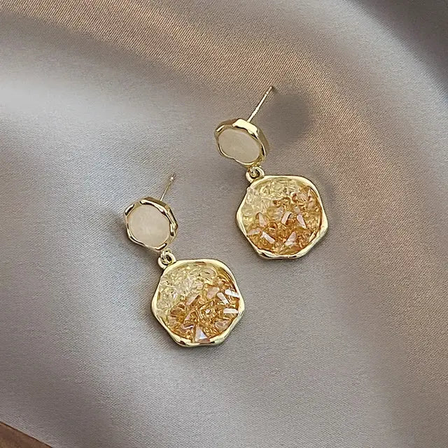 Elegant earrings with round crystals