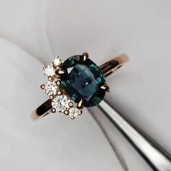 Vintage ring with blue crystal and zircons