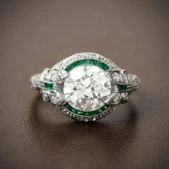 Vintage style ring made of green glass and white zirconia