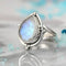 Ring with white opal in vintage style