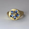 Ring with blue crystal flower in old gold color