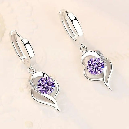Silver earrings with zircons