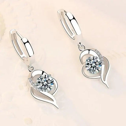 Silver earrings with zircons