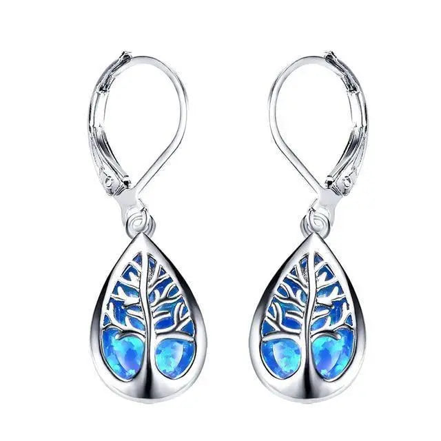 Earrings with opal and silver in the shape of a tree of life