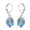 Earrings with opal and silver in the shape of a tree of life