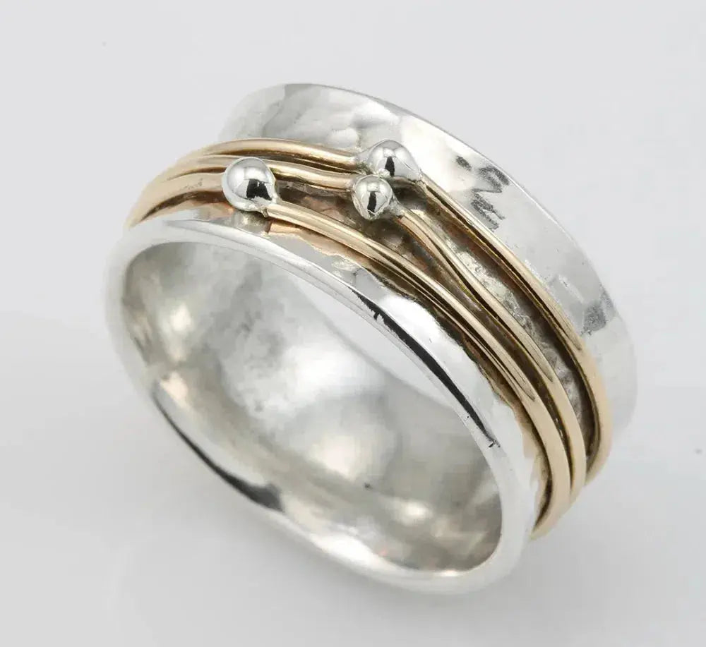 Silver ring with a layer of gold